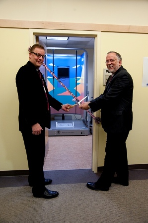 Portland VA Deputy Director, Mr. David Stockwell, joins Dr. Patrick Feeney in cutting the ribbon to the vestibular laboratory. 
