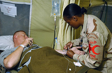 Registered nurse checks patient IV